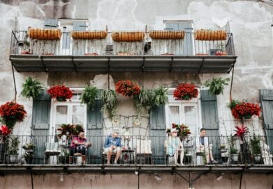 People Sitting on the Balcony of a Building in the French Quarter in New Orleans, Louisiana