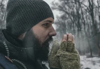 man wearing gray knit capp