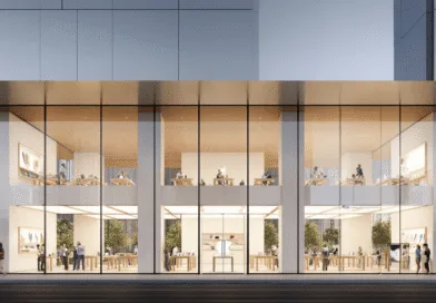 Midcent: Ett modernt teknikföretag med en stilren butik full av kunder och teknikanvändare, designad med stora glasfasader och minimalistisk inredning. Denna arkitektoniska pärla representerar innovation och framtid. Kategori: Teknik.