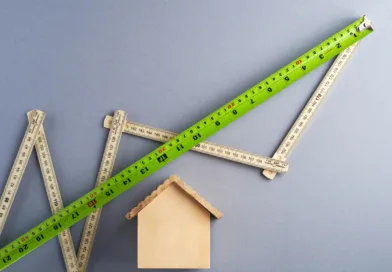 green ruler on white surface