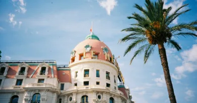 white and brown concrete building under blue sky during daytime